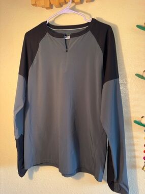 NWOT Marmot brand men's quarter-zip top is a technical athletic or hiking shirt